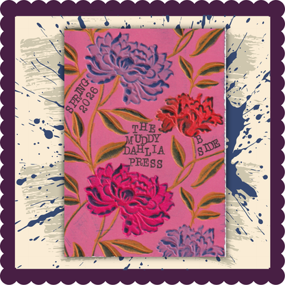 The Muddy Dahlia Extra B-Side Cover 
Floral design with text on a pink background, framed by a decorative border.